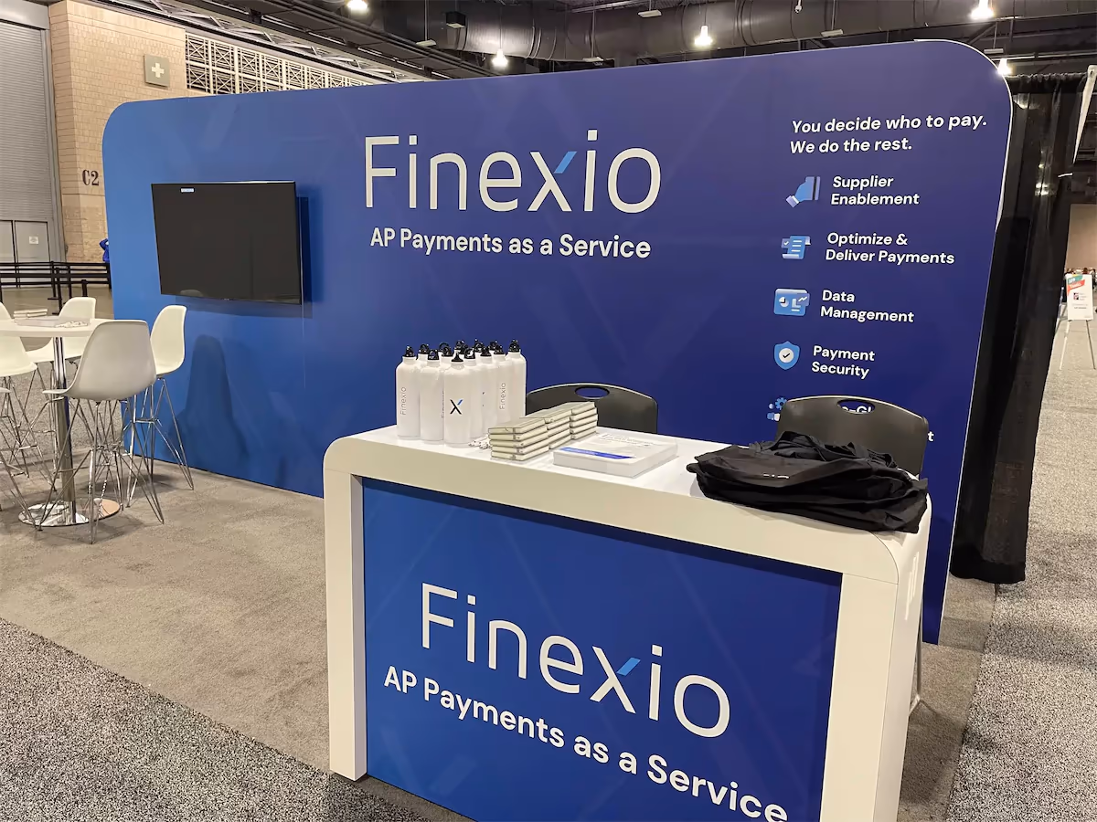 Finexio AP Payments as a Service booth at an industry conference